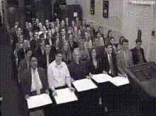 Audience holding up 10 scorecards