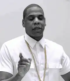 Jay-Z nodding and pointing