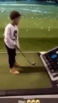 Toddler swings golf club and hits ground