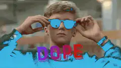 Dope guy puts on sunglasses