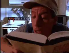 Seinfeld reading a book