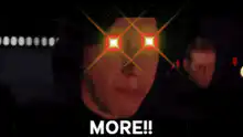 Man with glowing eyes screaming MORE