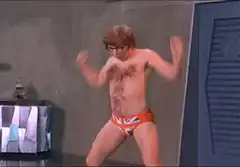 Austin Powers flexing in Union Jack underwear