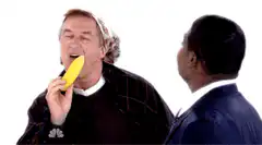 Terry Crews watching Nick Offerman eat corn
