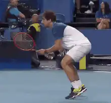 Tennis player bouncing on toes