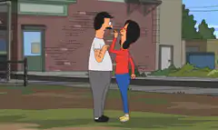 Bob and Linda kiss on the street