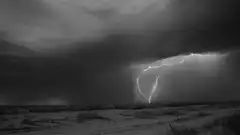 lightning bolt strikes in dark storm