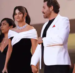 Selena Gomez and Rami Malek holding hands