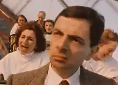 Mr. Bean looks annoyed