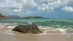 Ocean wave crashing on a rock