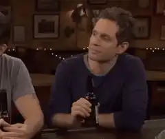 Nick Offerman laughing at the bar