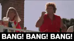 Cheerleader guy bangs fist