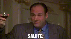Tony Soprano raises glass says salute