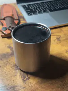 steam rising from coffee cup