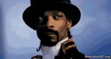 Snoop Dogg looking around suspiciously