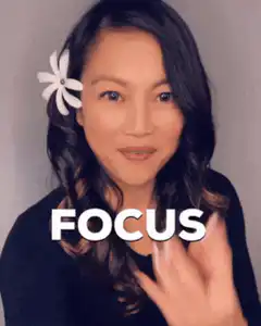 Woman snapping fingers with FOCUS text