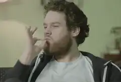 man making ok sign then waving