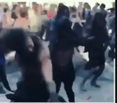 crowd dancing at outdoor party