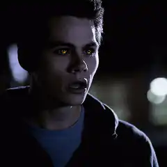 Stiles glowing orange eyes