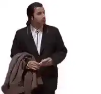 Vincent Vega holding jacket and talking