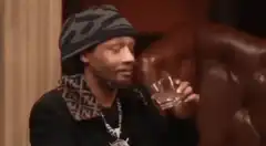 MC Hammer sipping a drink