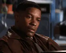 Denzel Washington chest bump smile