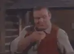 Man eating something and nodding