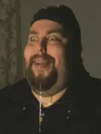 Man with drool and wide eyes
