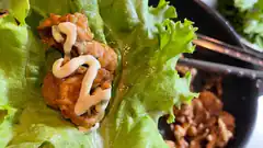 lettuce wrap with meat and sauce