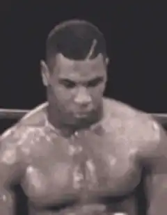 Mike Tyson looking down
