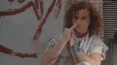 Wayne Campbell shaka sign