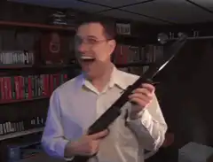 Man firing a rocket launcher