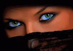 Woman with green eyes and black veil