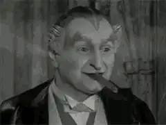 Man smoking cigar with steam coming out of ears