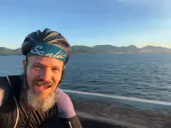 Cyclist selfie by the water