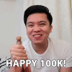 Man popping champagne bottle happy 100k