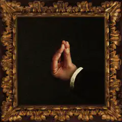 Hand in ornate gold frame
