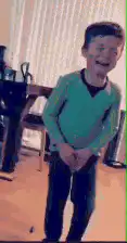 Boy laughing and shaking
