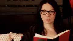 Laura Prepon reading a book