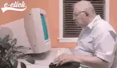 Old man clicks My Computer