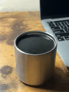 black coffee in metal cup