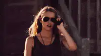 Woman walking away from explosion
