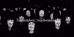 Crowd of Guy Fawkes masks with text