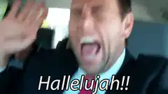 Man in car screaming Hallelujah