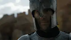 Knight in armor looks around