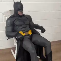 Batman rocking in a chair