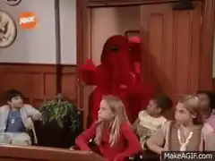 Elmo dances in a classroom