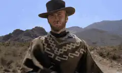 Clint Eastwood adjusting poncho