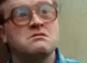 Man with glasses eyes bulging