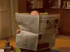 Jason Alexander lowers newspaper